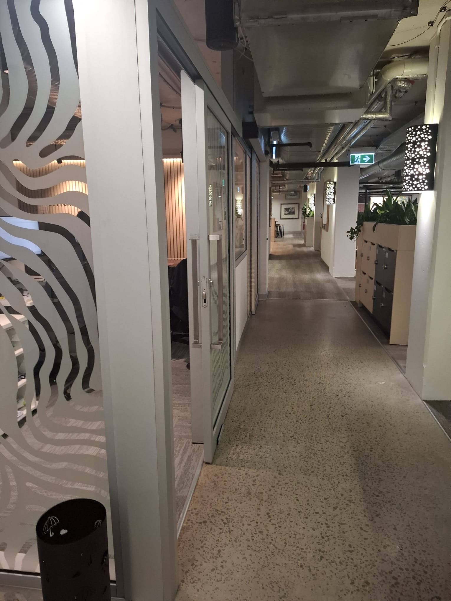 Corridor with Glass Meeting Pods