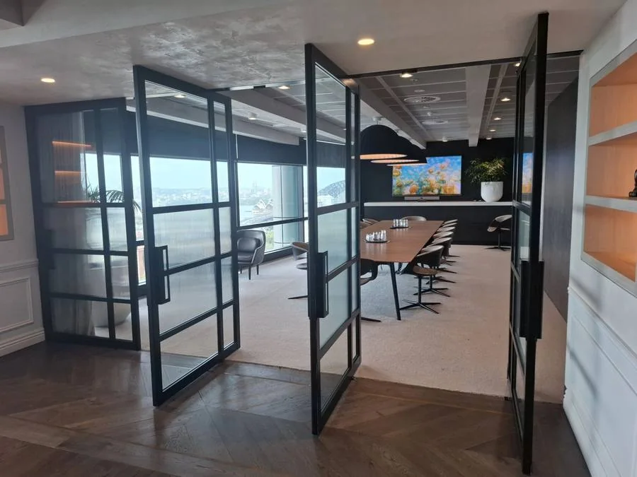 Winten Property Group boardroom — C-Bus lighting fault finding North Sydney